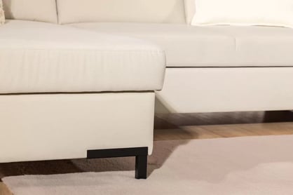 Rohová pohovka Loario L levostranná se širokým, vykrojeným bokem - krémová tkanina Sand 03 Rohová sedací souprava Loario L levá z szerokim, wcietym bokiem - Sand 03