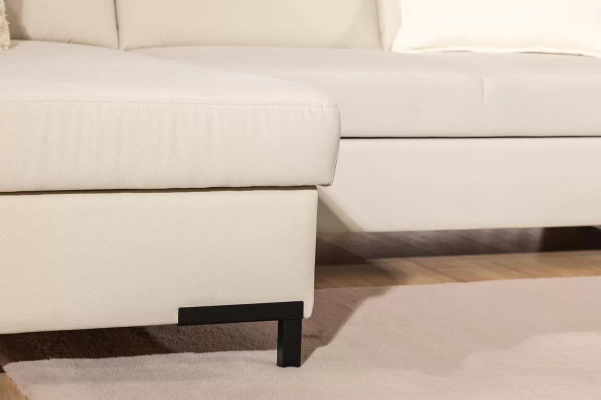 Rohová pohovka Loario L levostranná se širokým, vykrojeným bokem - krémová tkanina Sand 03 Rohová sedací souprava Loario L levá z szerokim, wcietym bokiem - Sand 03