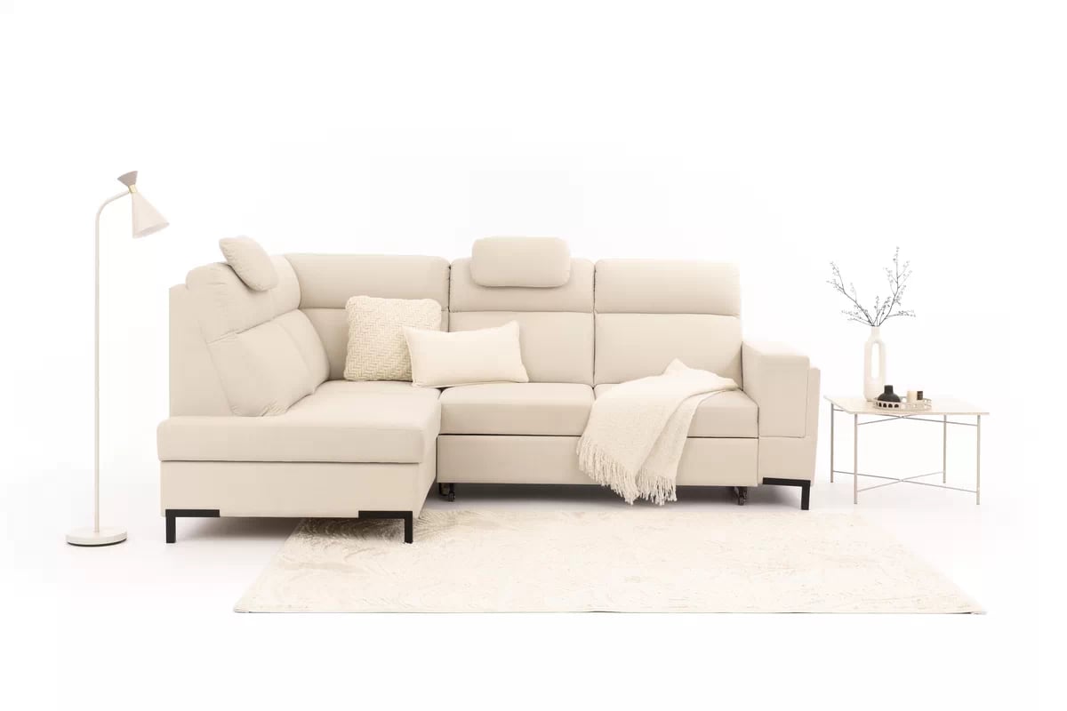 Rohová pohovka Loario L levostranná se širokým, vykrojeným bokem - krémová tkanina Sand 03 Rohová sedací souprava Loario L levá z szerokim, wcietym bokiem - Sand 03