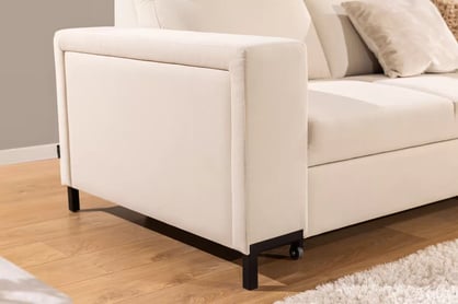 Rohová sedačka Loario L pravostranná se širokým bokem - krémová tkanina Sand 03 Rohová sedací souprava Loario L pravá z szerokim bokiem - Sand 03