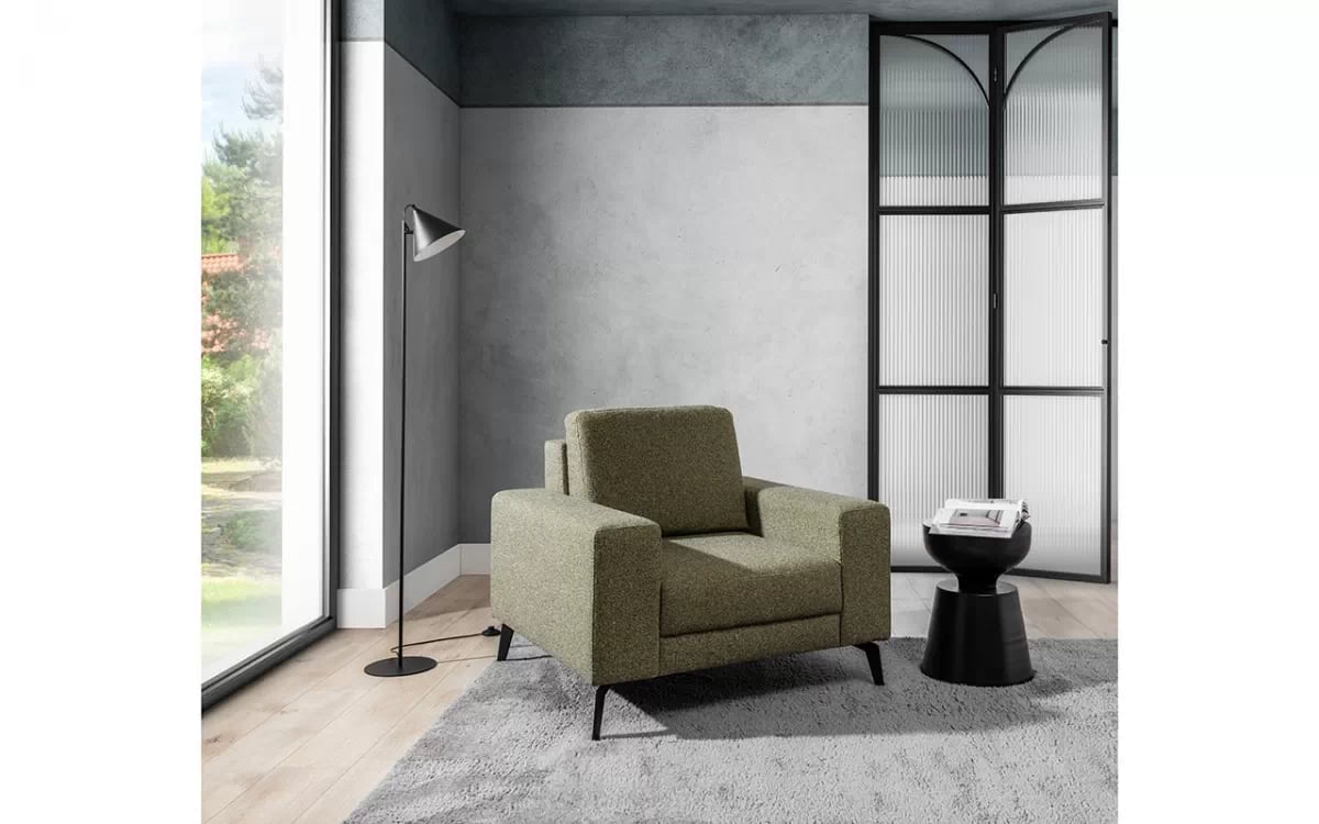 Čalouněné křeslo Elentio Zelený Křeslo z wysokimi nozami 