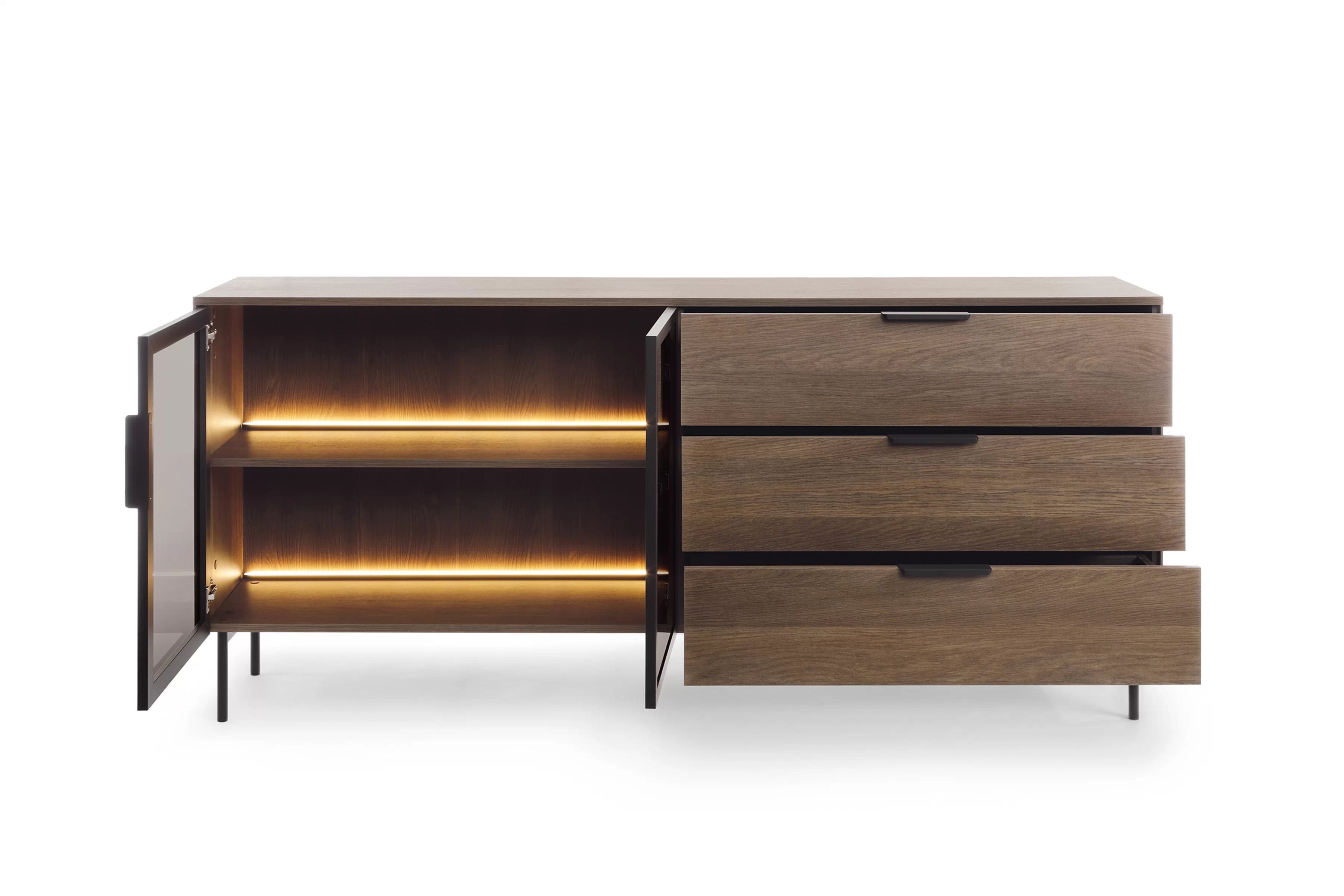 Komoda Auri 181 cm se zásuvkami a osvětlením - dub dunin / černá Komoda Auri 181 cm se zásuvkami i oswietleniem - dub dunin / černá