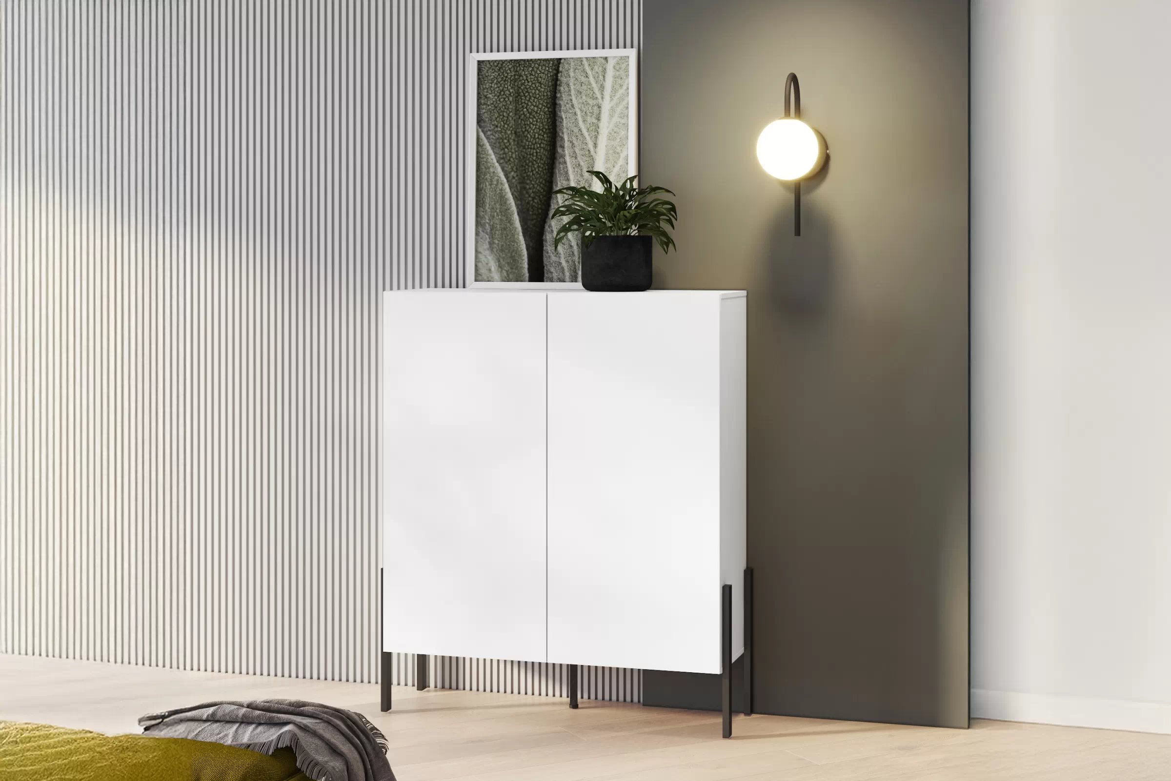 Komoda Jukon 114 cm do obývacího pokoje - bílý supermat / černé nohy Komoda pro obývacího pokoje Wezilo 42 - 114 cm - bílá supermat