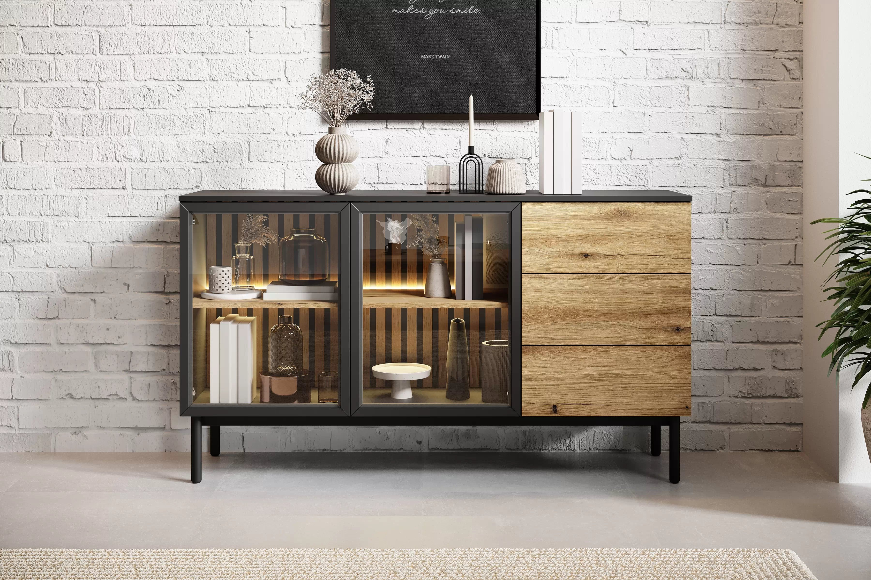 Komoda Noro 150 cm se zásuvkami a LED osvětlením - dub evoke / černá Komoda Noro 150 cm se zásuvkami i oswietleniem LED - dub evoke / černá