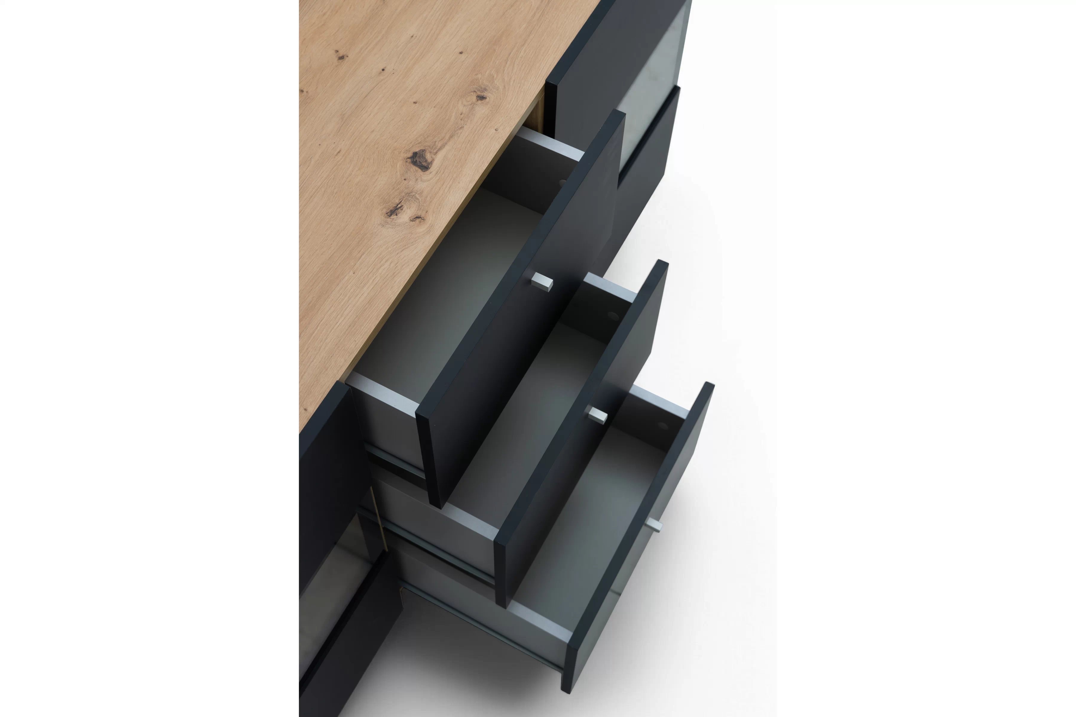 Komoda Baros 132 cm se zásuvkami - dub artisan / černý mat Komoda se zásuvkami Baros 26 - 132 cm - dub artisan / černá mat