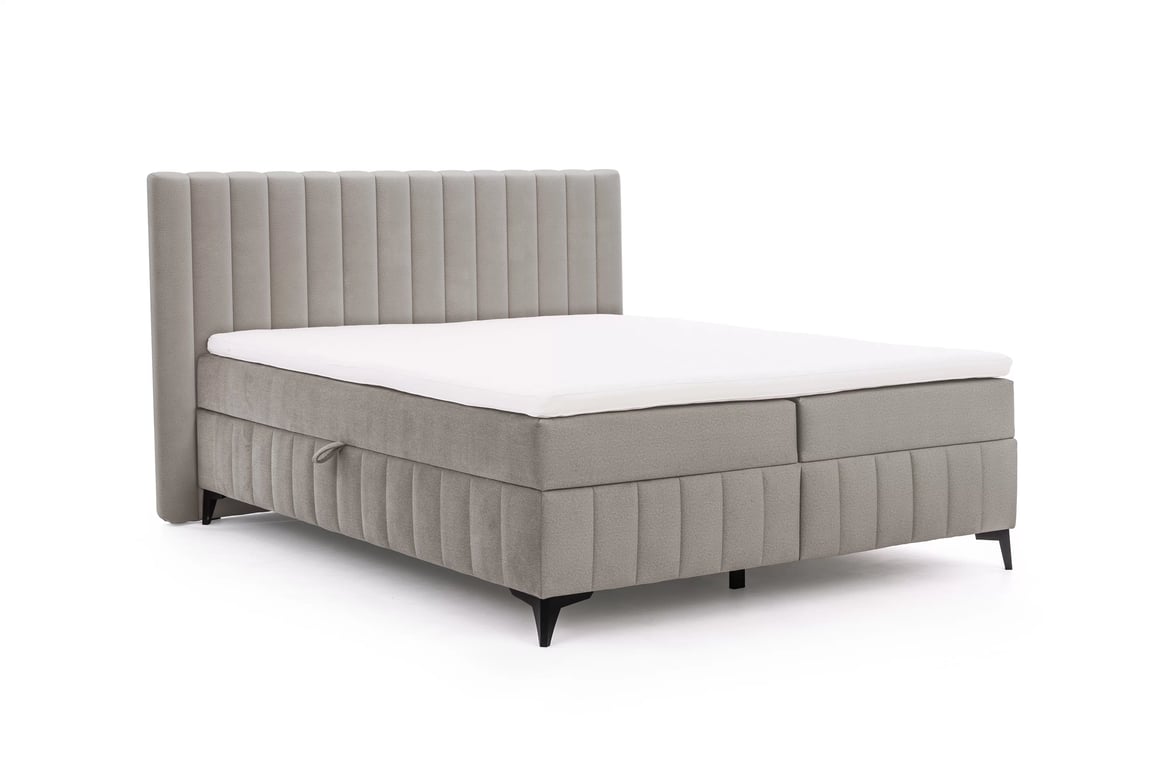 Kontinentálna posteľ Verona 180x200 s úložným priestorom – béžový hydrofóbny zamat Amon 16 Boxspring posteľ Verona 180x200 s úložným priestorom - béžový velúr hydrofobowy Amon 16 