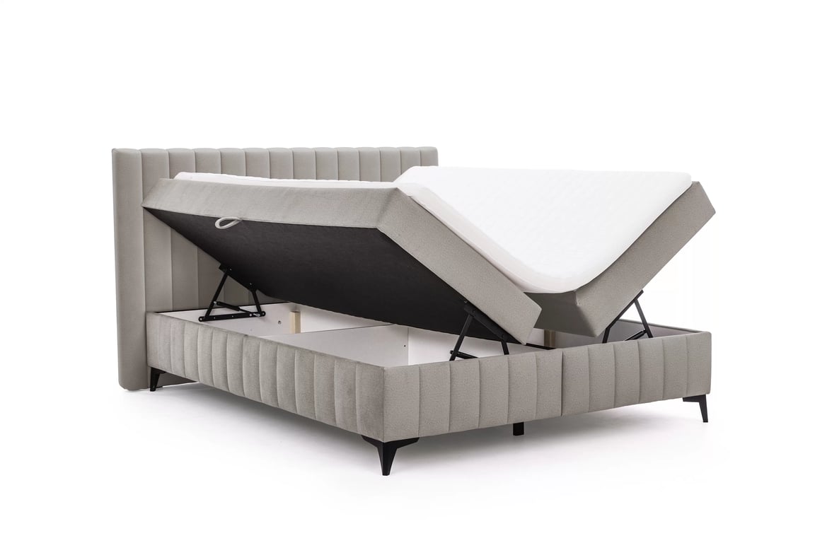 Kontinentálna posteľ Verona 180x200 s úložným priestorom – béžový hydrofóbny zamat Amon 16 Boxspring posteľ Verona 180x200 s úložným priestorom - béžový velúr hydrofobowy Amon 16 