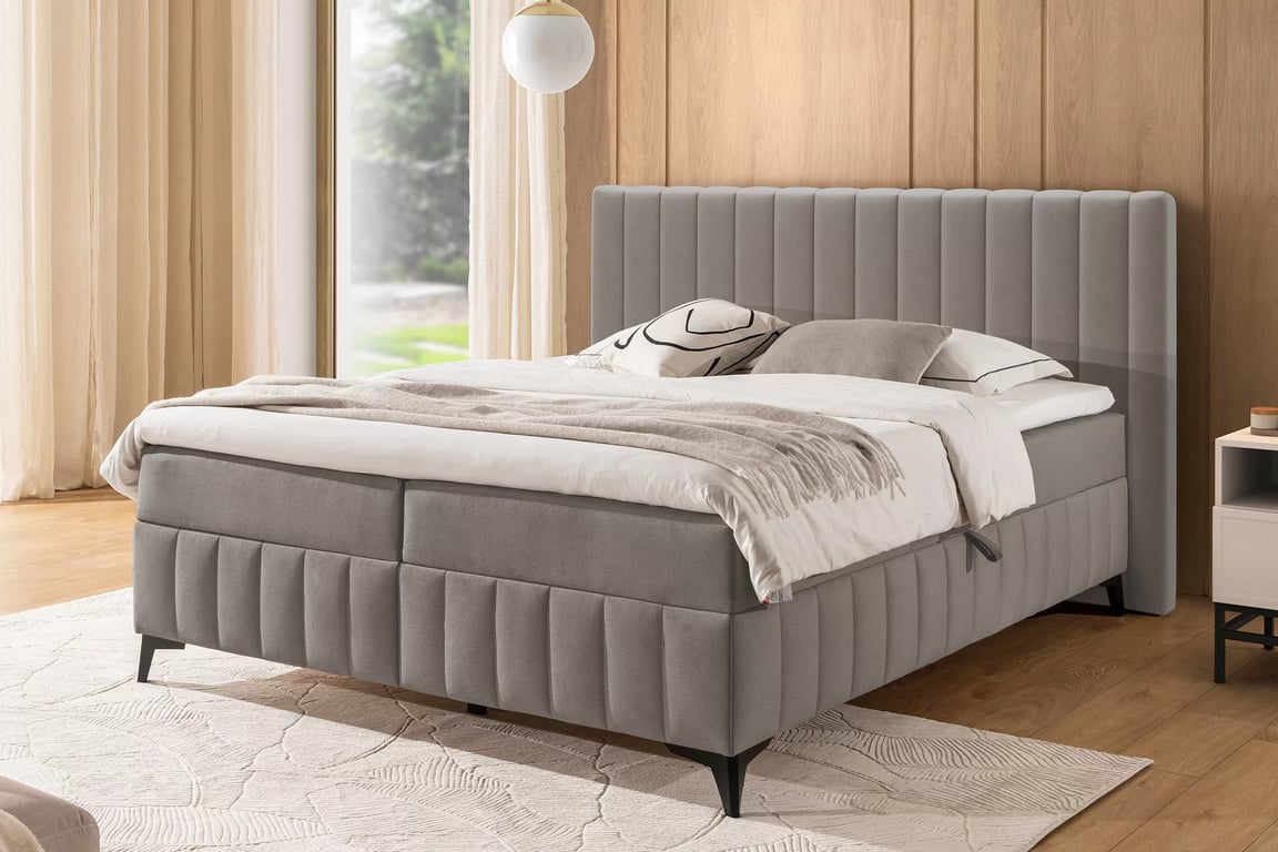 Kontinentálna posteľ Verona 180x200 s úložným priestorom – béžový hydrofóbny zamat Amon 16 Boxspring posteľ Verona 180x200 s úložným priestorom - béžový velúr hydrofobowy Amon 16 