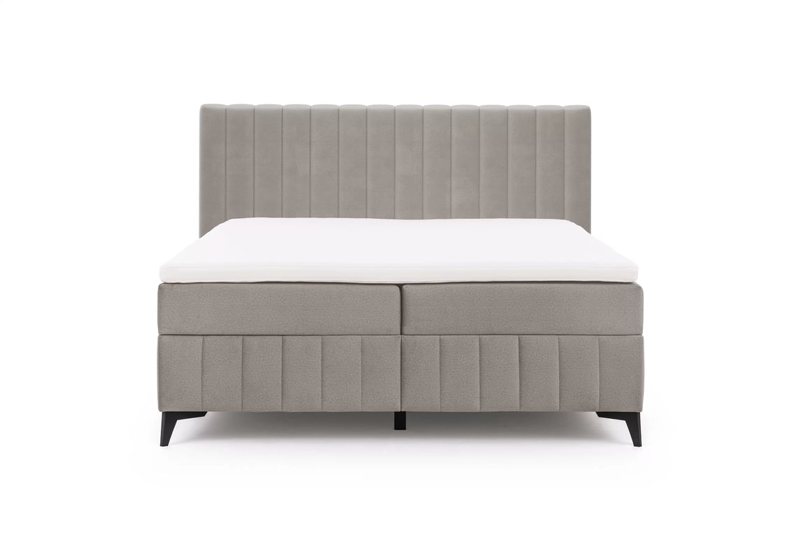 Kontinentálna posteľ Verona 180x200 s úložným priestorom – béžový hydrofóbny zamat Amon 16 Boxspring posteľ Verona 180x200 s úložným priestorom - béžový velúr hydrofobowy Amon 16 