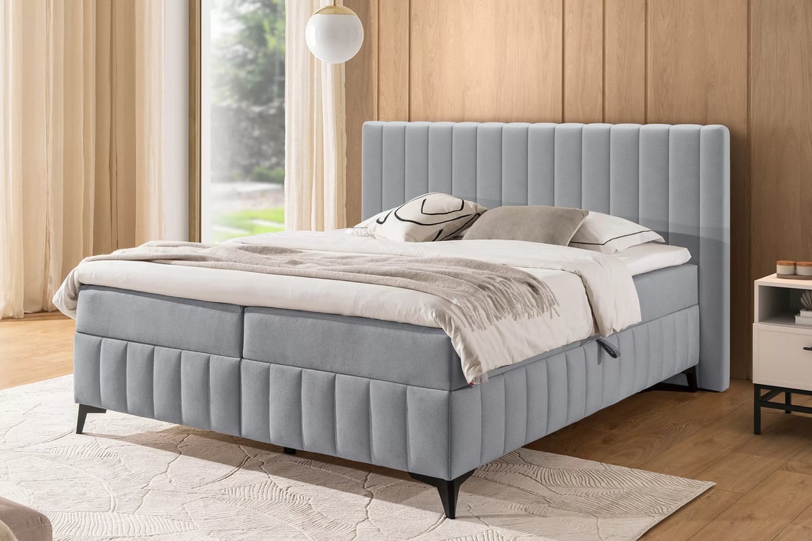 Kontinentálna posteľ Verona 180x200 s úložným priestorom – sivý hydrofóbny zamat Amon 10 Boxspring posteľ Verona 180x200 s úložným priestorom - šedý velúr hydrofobowy Amon 10 