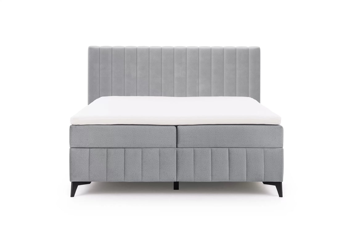 Kontinentálna posteľ Verona 180x200 s úložným priestorom – sivý hydrofóbny zamat Amon 10 Boxspring posteľ Verona 180x200 s úložným priestorom - šedý velúr hydrofobowy Amon 10 