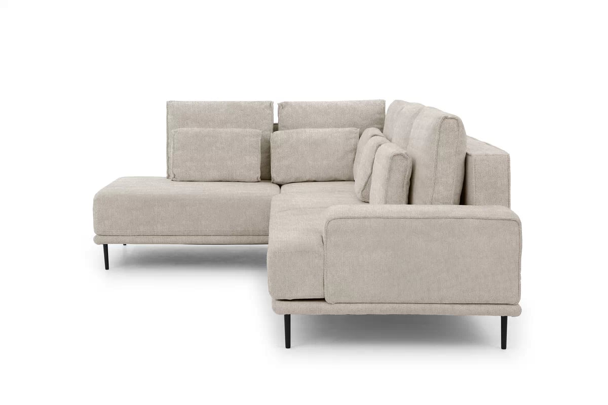 Rohová sedací souprava Nicole L levá - béžová látka Hevia 207.09 / černé nožky Rohová sedací souprava do obývacího pokoje Nicole L levá - béžová potahová látka Hevia 207.09/nozki černá