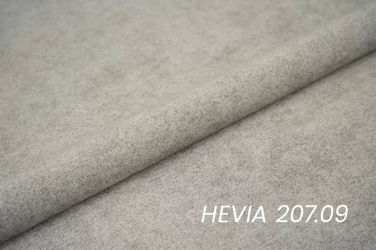 Rozkládací rohová sedací souprava Nicole L levá - šedá látka Hevia 207.17 / černé nožky Rohová sedací souprava do obývacího pokoje Nicole L levá - šedá potahová látka Hevia 207.17 / nozki černá