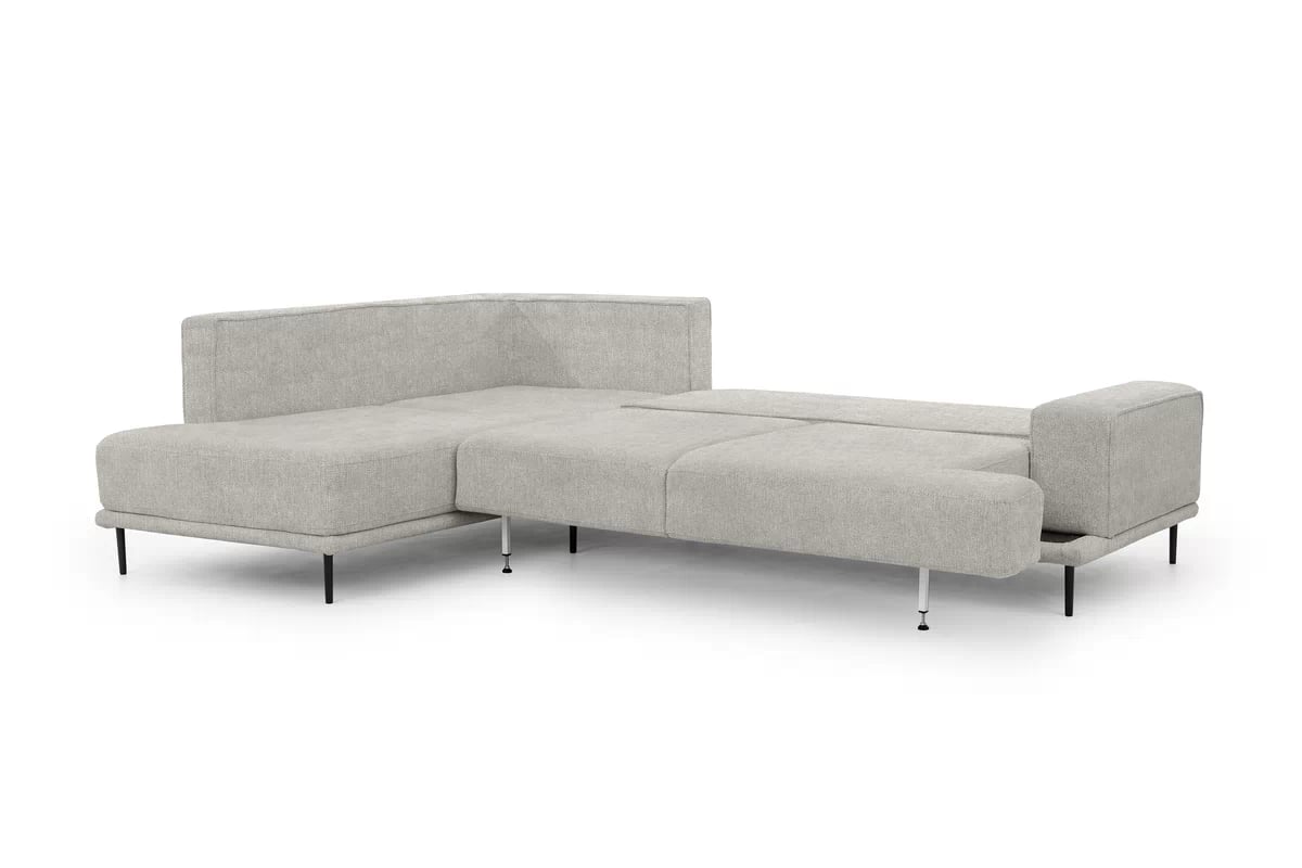 Rozkládací rohová sedací souprava Nicole L levá - šedá látka Hevia 207.17 / černé nožky Rohová sedací souprava do obývacího pokoje Nicole L levá - šedá potahová látka Hevia 207.17/nozki černá