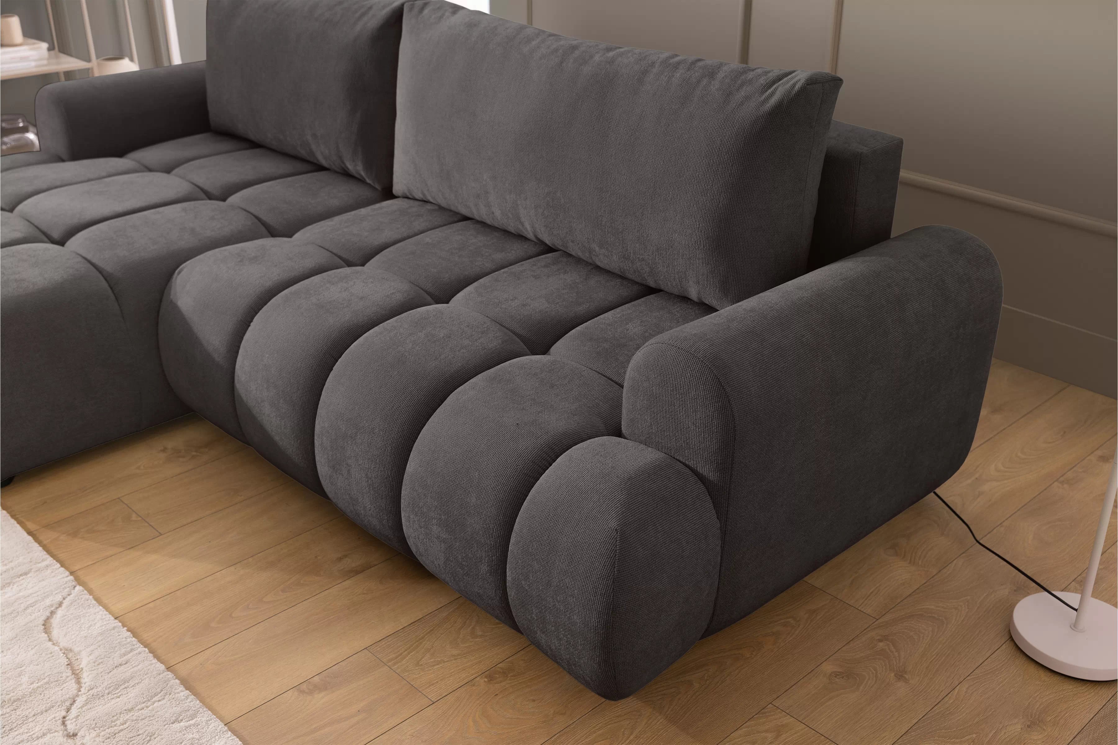 Rozkládací rohová sedací souprava Lutario Mini levá - tmavě šedá Venice 2021 Rohová sedací souprava Lutario Mini rozkládací levá - ciemnoszara plecionka hydrofobowa Venice 2021