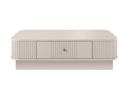 Kávový stolík Vesper 103x60 cm so zásuvkou na sokli - kašmír / zlatá úchytka Stolík kawowy Vesper 103x60 cm z szuflada na sokelu - kašmír / zlaté Úchytka